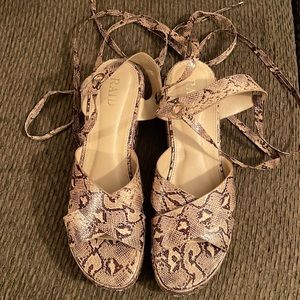 Snake platform sandals